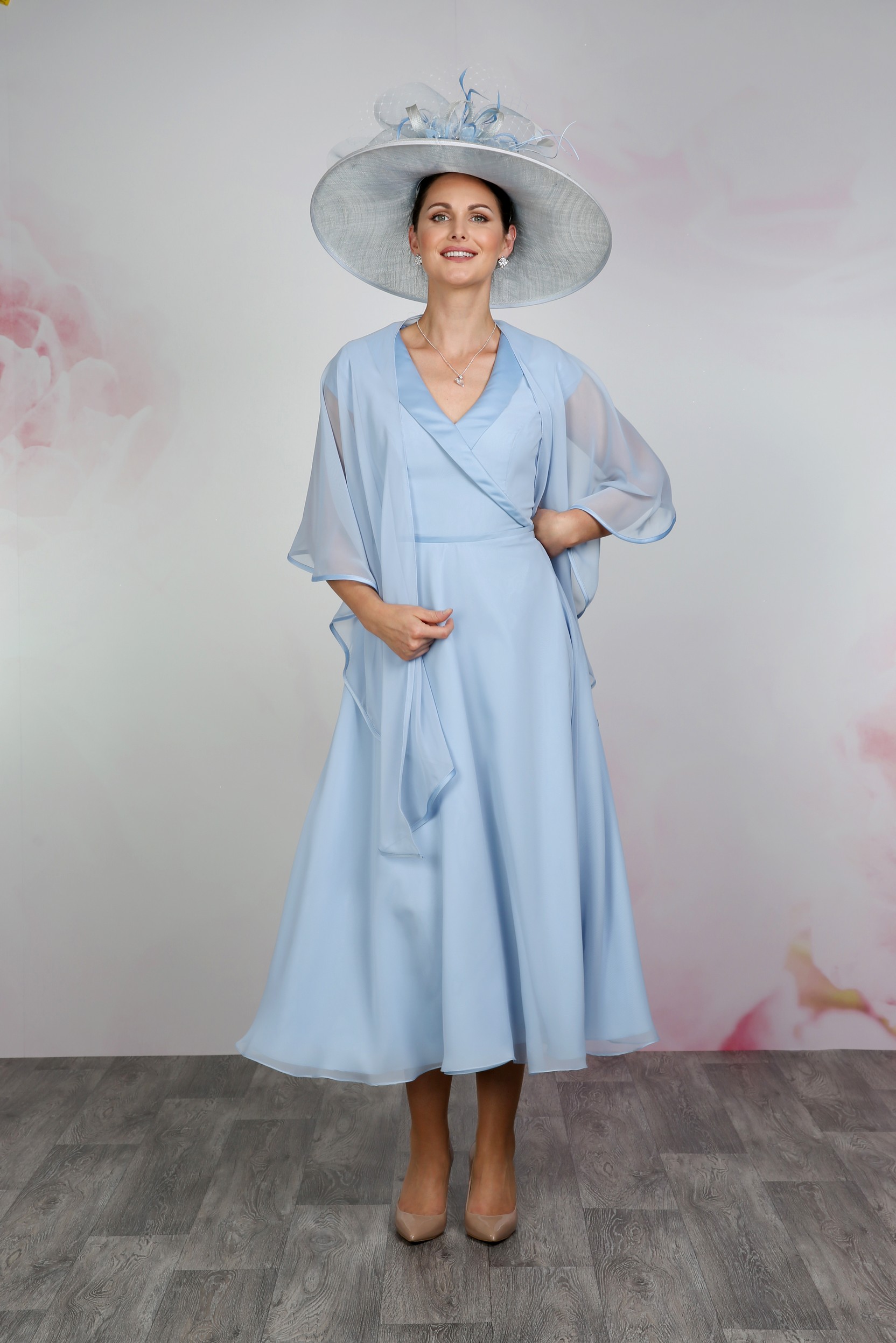 The elegant and modern Astrid dress makes for a clever presentation for the Mother of the Bride