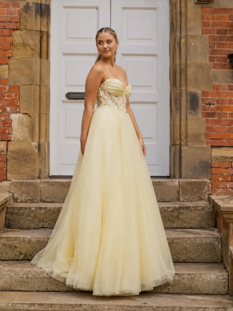 Camila pale butter-yellow ballgown with sweeping shimmer tulle skirt from MK Prom