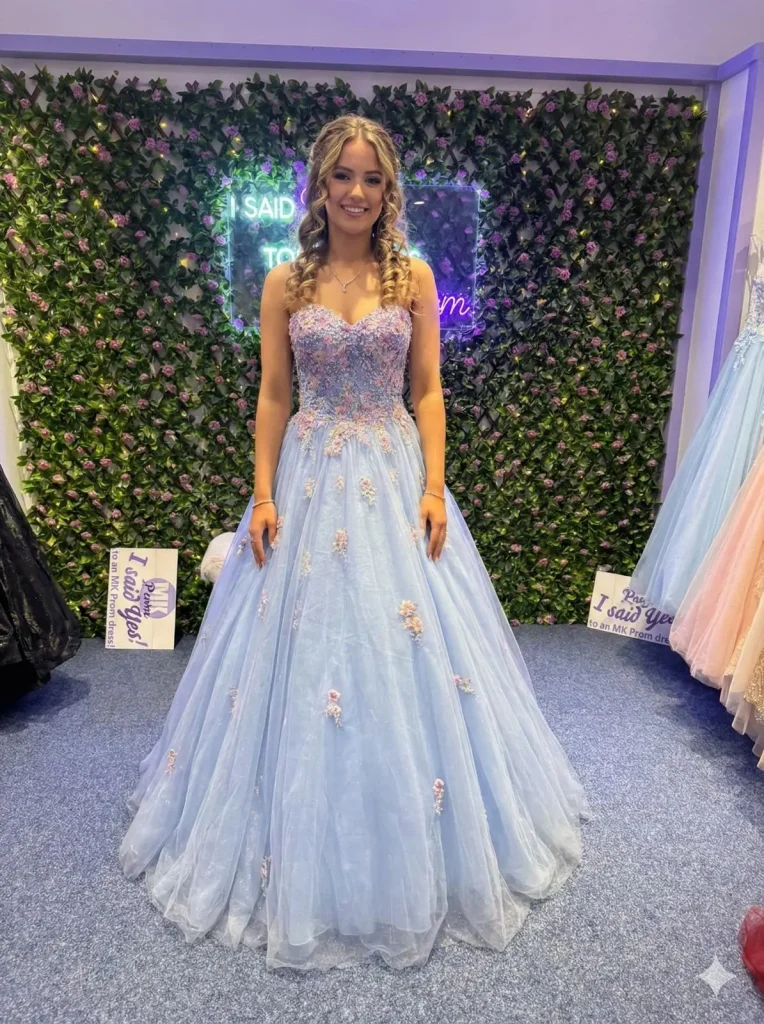 Celeste powder blue ballgown with floral appliques and full sparkling tulle skirt from MK Prom