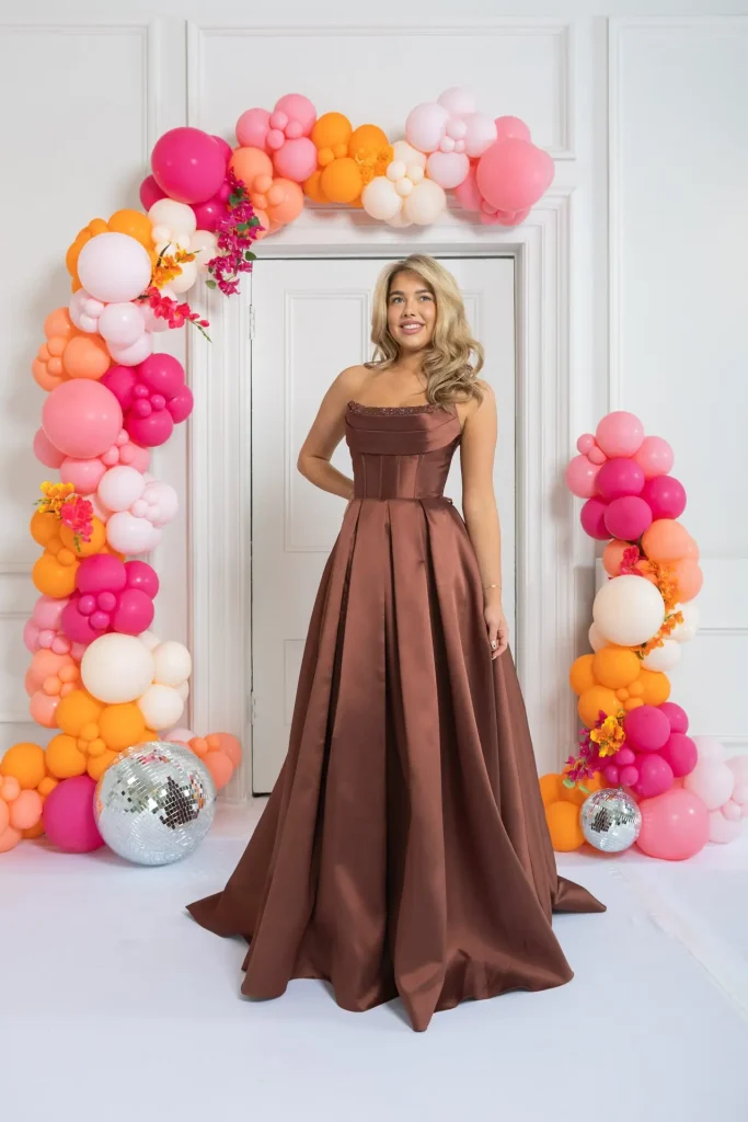 Valentina A-line gown in chocolate brown from MK Prom, suited to evening and reception wear.